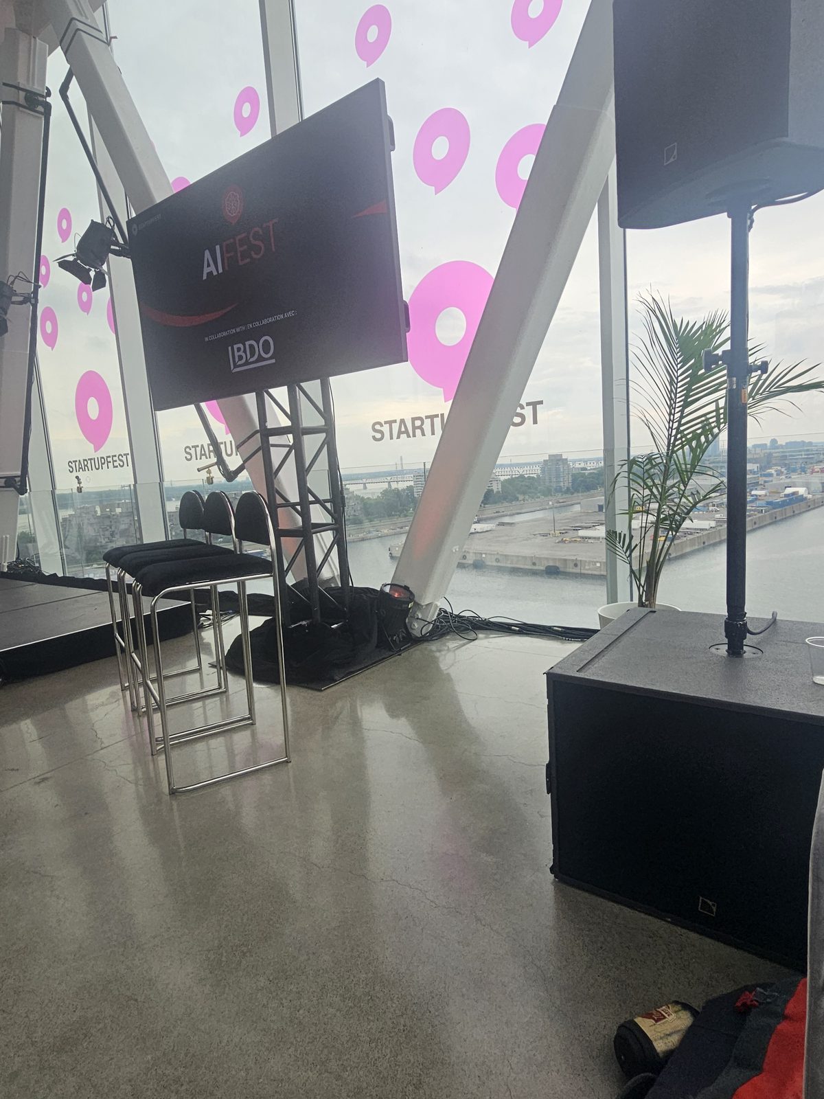 AIFest on the Sky Stage — glass walls over the Old Port, hosted by Startupfest content chair Alistair Croll.