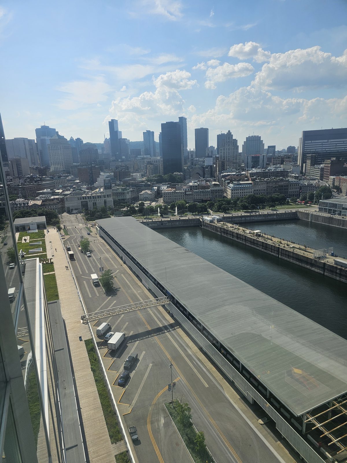 Montréal from the Sky Stage glass — Old Town, the canal, and the city that hosted all of it.